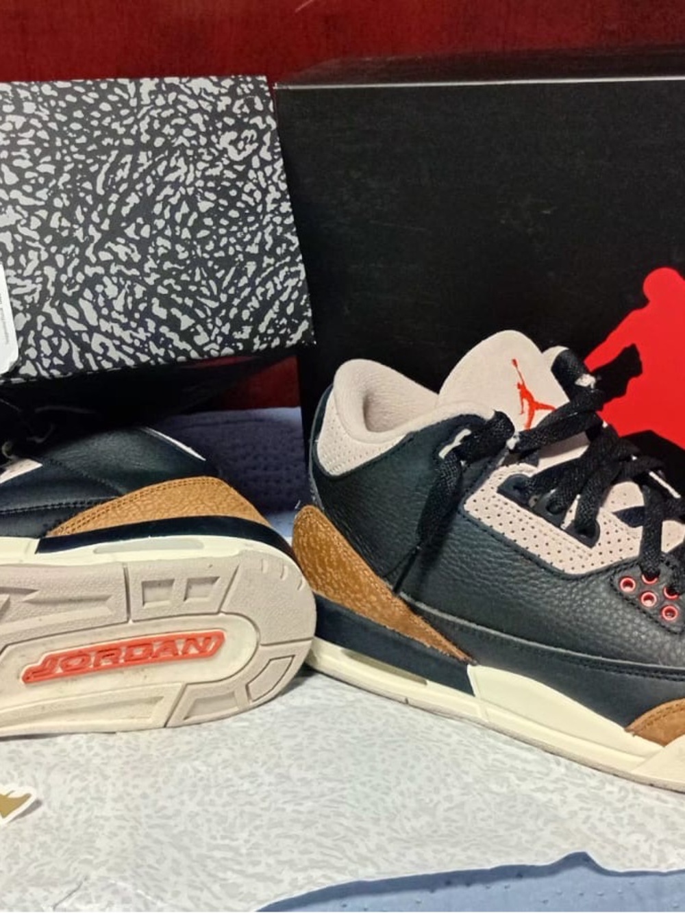 Jordan Kids Black and Brown Sneakers with Red Logo Accents